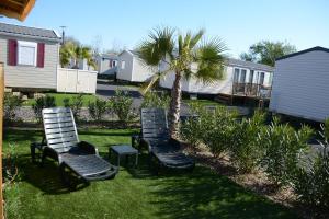 Campings Mobil home - Clim, LL, TV - Camping La Carabasse '4 etoiles' - 003 : photos des chambres