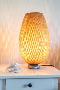 Appartements L'Odyssee provencale, un duplex de charme de 2 chambres au pied du village medieval de Bormes-les-Mimosas, offrant des prestations haut de gamme et une superbe vue sur le Massif des Maures : photos des chambres