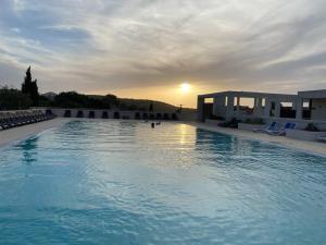 Ma paillote a LOZARI 68 pers vue mer avec piscine