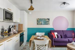 Appartements Le Pourpre : photos des chambres