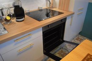 Appartements Le Pourpre : photos des chambres