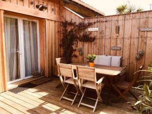 Maisons de vacances Cocon entre presqu'ile du Cap Ferret et plages oceanes - terrasse - 1 velo gratuit : photos des chambres