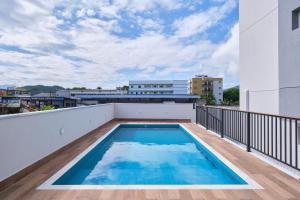 2 QUARTOS com Churrasqueira na Varanda, Piscina, Garagem interna, WiFi 500mbps, Ar Condicionado e Telas de Proteção