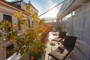 The Marble Suites, PLAKA