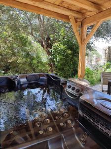 Appartements Entre mer & maquis, l'ame de la Corse en gites de charme avec jacuzzi, proche Ajaccio : photos des chambres