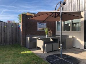 Comfortabel 6-persoons huisje nabij strand, bos, duinen en stad