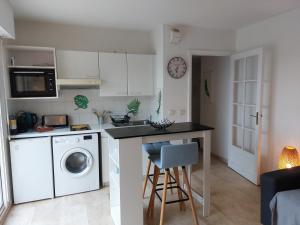 Appartements Studio Golf Riviera - Axelle Loc'Appart : photos des chambres