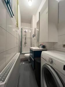 Słoneczny apartament centrum Poznania klimatyzacja wi-fi TV zmywarka pralka piekarnik