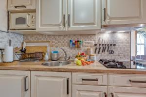 Rozis Riverside Cottage - Happy Rentals