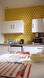 Appartements L’appartement Le Mer’Ville : photos des chambres