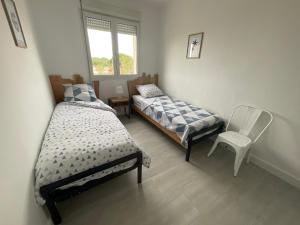 Appartements ENTRE MER ET ARENE : photos des chambres