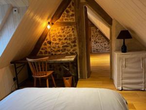 Maisons de vacances Chaleureuse ferme restauree au calme avec piscine : photos des chambres