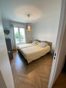 Appartements superbe T3 centre ville avec garage ferme : photos des chambres