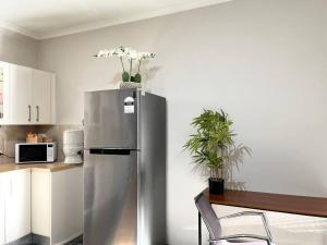 Private Unit underneath a family Home