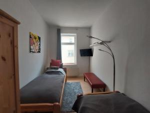 Schöne Zwei-Zimmer-Wohnung "W2" mit 4 Einzelbetten und WLAN in Zwenkau bei Leipzig im Neuseenland