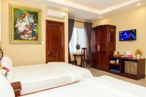 Phòng Deluxe 4 Người (Deluxe Quadruple Room)