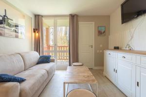 Appartements Appartement avec piscine, tennis et parking : photos des chambres