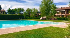 Apartment in residence with swimming pool near Peschiera del Garda.