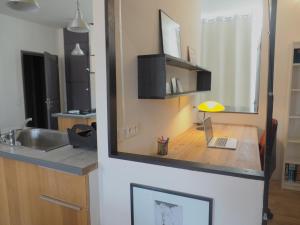 Appartements Calme et confort en coeur de ville : photos des chambres