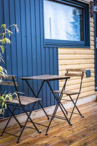 Maisons de vacances La tiny house exigue IJ : photos des chambres