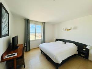 Hotels Les Alizes : photos des chambres