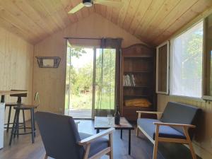 Chalets Studio en bois independant avec terrasse et jardin : photos des chambres