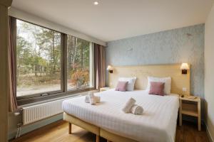 Villages vacances Center Parcs Les Hauts de Bruyeres : photos des chambres