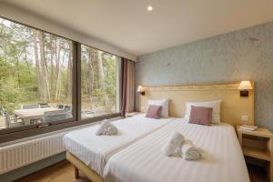 Villages vacances Center Parcs Les Hauts de Bruyeres : photos des chambres