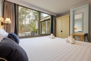 Villages vacances Center Parcs Les Hauts de Bruyeres : photos des chambres