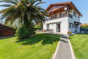 Maisons de vacances Maison Urt - Charmante maison avec piscine : photos des chambres