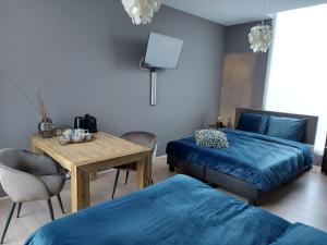 Bed & Wellness Boxtel, 4 persoonskamer met eigen badkamer