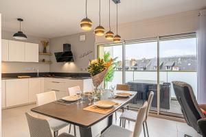 Appartements L'Audacieux - Appt neuf avec vue sur les toits : photos des chambres