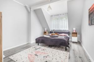 Family Three Bedroom Apartment Podczele Sunrise by Noclegi Renters