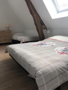 Appartements Les ecuries de Bleville : photos des chambres