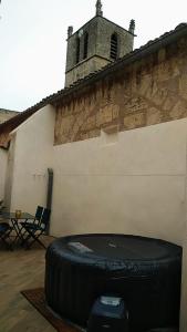 Appartements Les Toucans sous le clocher terrasse - SPA - parking et wifi gratuit : photos des chambres