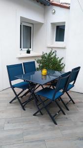 Appartements Les Toucans sous le clocher terrasse - SPA - parking et wifi gratuit : photos des chambres