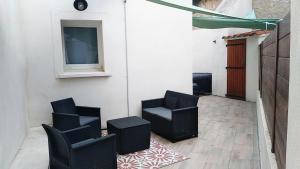 Appartements Les Toucans sous le clocher terrasse - SPA - parking et wifi gratuit : photos des chambres