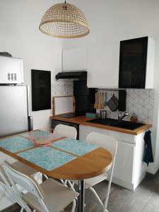 Appartements Les Toucans sous le clocher terrasse - SPA - parking et wifi gratuit : photos des chambres