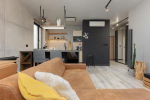 Industrial Pet-Friendly Apartment with Movie Projector by Renters