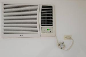 Loft Centrico 4 camas ,Aire acondicionado,WIFI, parking, refrigerador, microhondas