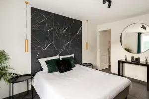 Appartements LE CHILL Suite & SPA (Jacuzzi et Sauna prives) : photos des chambres