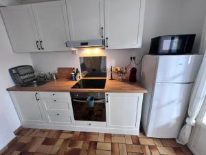 Sympathique studio en Rez de jardin dans résidence