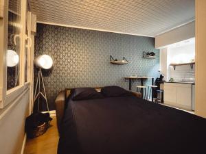 Appartements Le Studio des Halles • Hypercentre • Netflix : photos des chambres