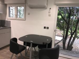 Maisons de vacances Studio Luxe + jardin et terrasse : photos des chambres