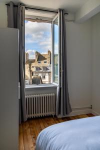 Appartements LUNA - Appartement 4 pers - Dinan : photos des chambres