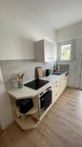 Apart70-Modern Design I Garden with Terrace I Smart TV I Free Parking I Free WiFi