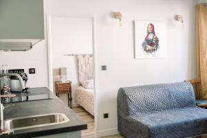 Appartements Le Saint Amans : photos des chambres