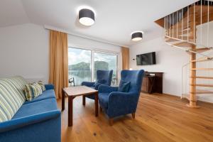 Family Room with Lake View room in Hotel Seegasthof Stadler