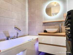 Appartements Bel F3 en residence avec piscine, baignoire balneo : photos des chambres