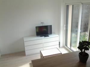 Appartements Appartement avec Jardin : photos des chambres